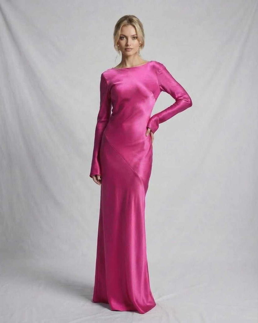 Vibrant pink Luna Maxi Dress by Lauven, showcasing a sleek satin design and a modern silhouette, ideal for elegant occasions.