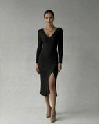 Lauven Luna Midi Dress in black, ribbed knit V-neck design, featuring a thigh-high slit for a sophisticated look.
