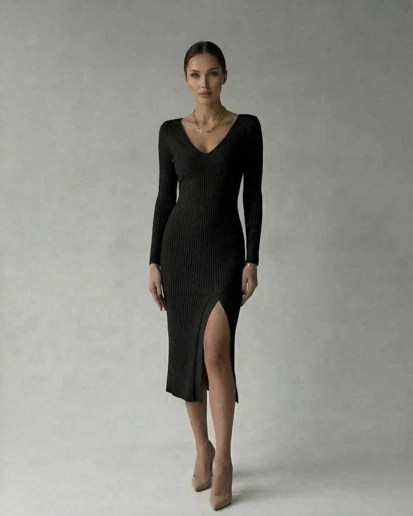 Lauven Luna Midi Dress in black, ribbed knit V-neck design, featuring a thigh-high slit for a sophisticated look.