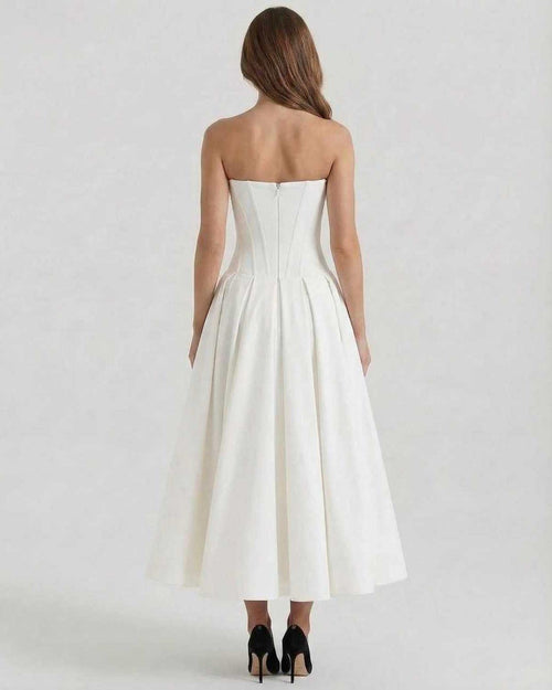 Luna Midi Dress by Lauven, elegant strapless white A-line ankle-length dress, back view showcasing flowing skirt.