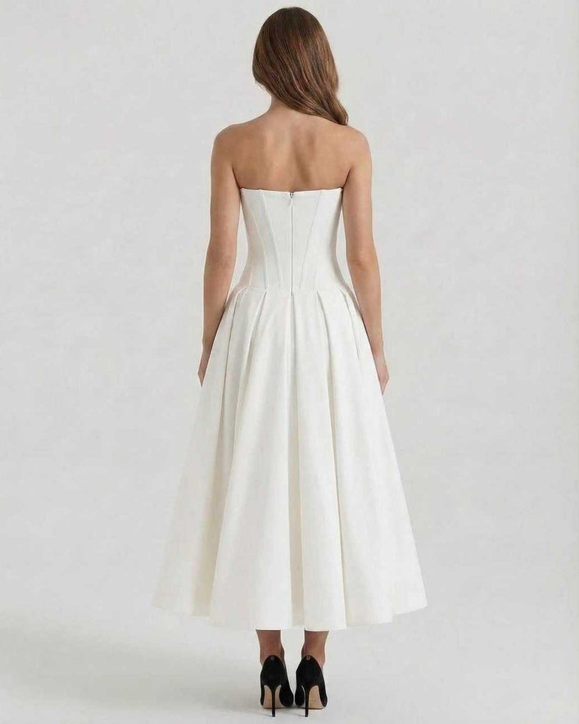 Luna Midi Dress by Lauven, elegant strapless white A-line ankle-length dress, back view showcasing flowing skirt.