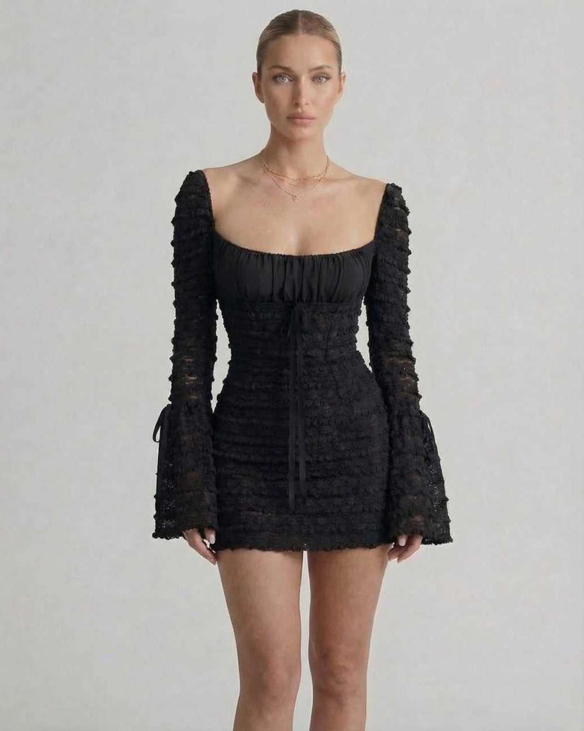 Luna Mini Dress by Lauven featuring an elegant black sheath silhouette with flare sleeves and a square neckline.