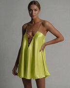 Luna Mini Dress by Lauven in vibrant chartreuse color featuring A-line flared silhouette and beaded spaghetti straps.