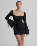Luna Mini Dress by Lauven featuring an elegant sheath silhouette with flare sleeves in black textured fabric.