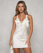 Luna Mini Dress by Lauven - Elegant satin V-neck mini dress with lace trim in ivory tone.