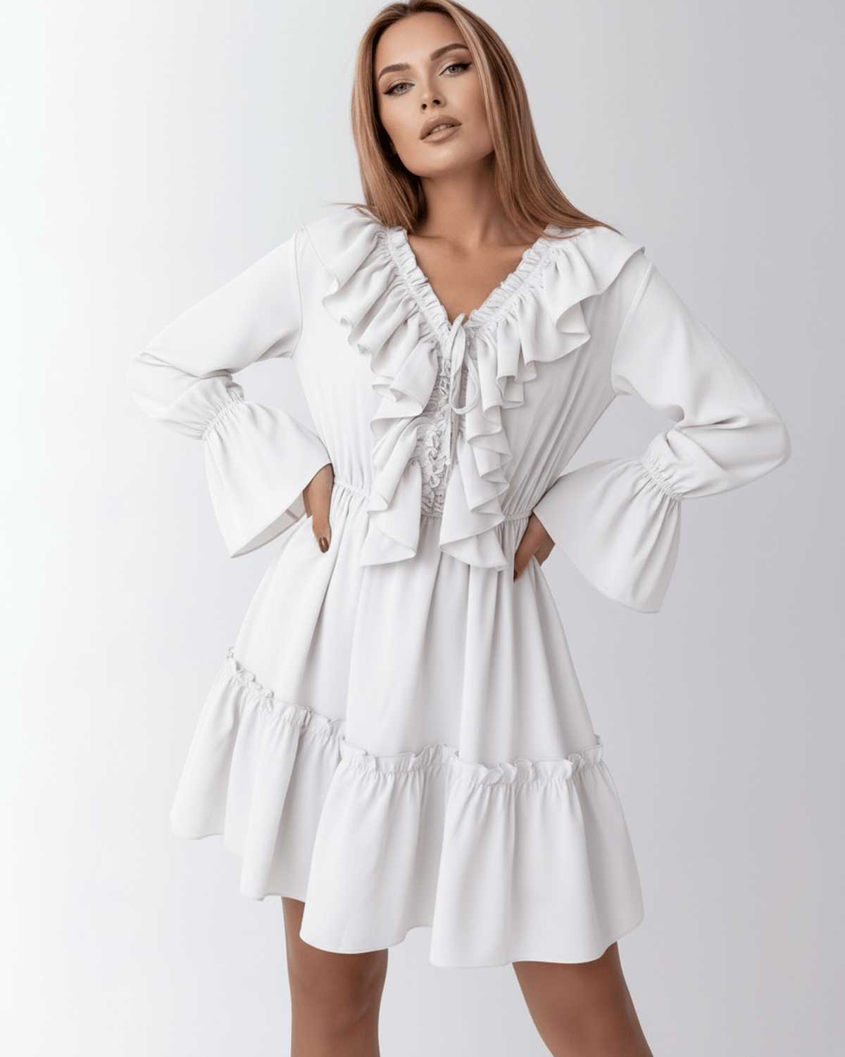 Lauven Luna Mini Dress featuring ruffled V-neck, elastic waist, and bell cuffs in elegant white.