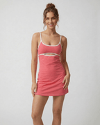 Luna Mini Dress by Lauven in vibrant pink with patchwork design and cut-out detail, perfect for summer.