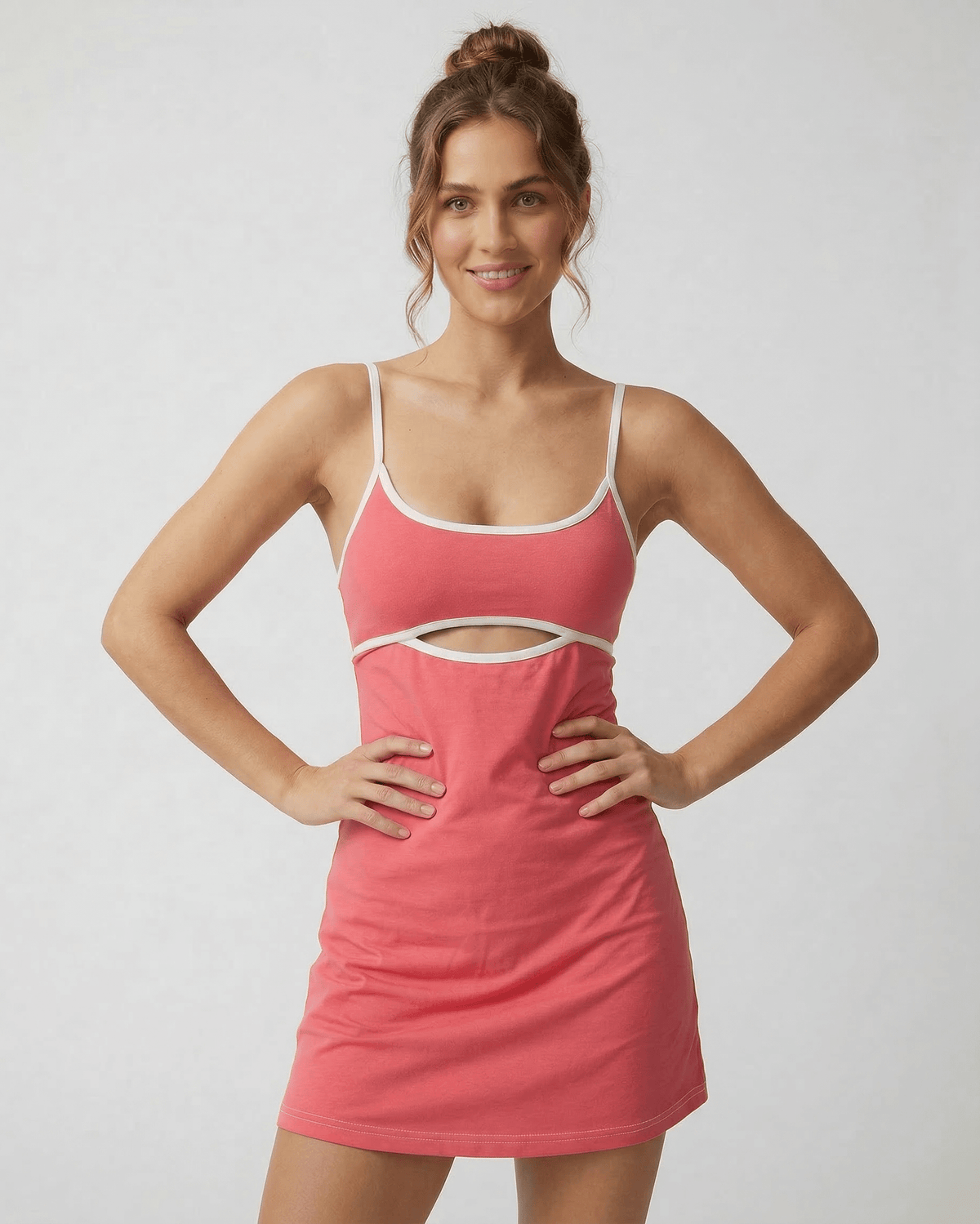 Lauven Luna Mini Dress in vibrant pink with patchwork design and cut-out detail, perfect for summer fashion.