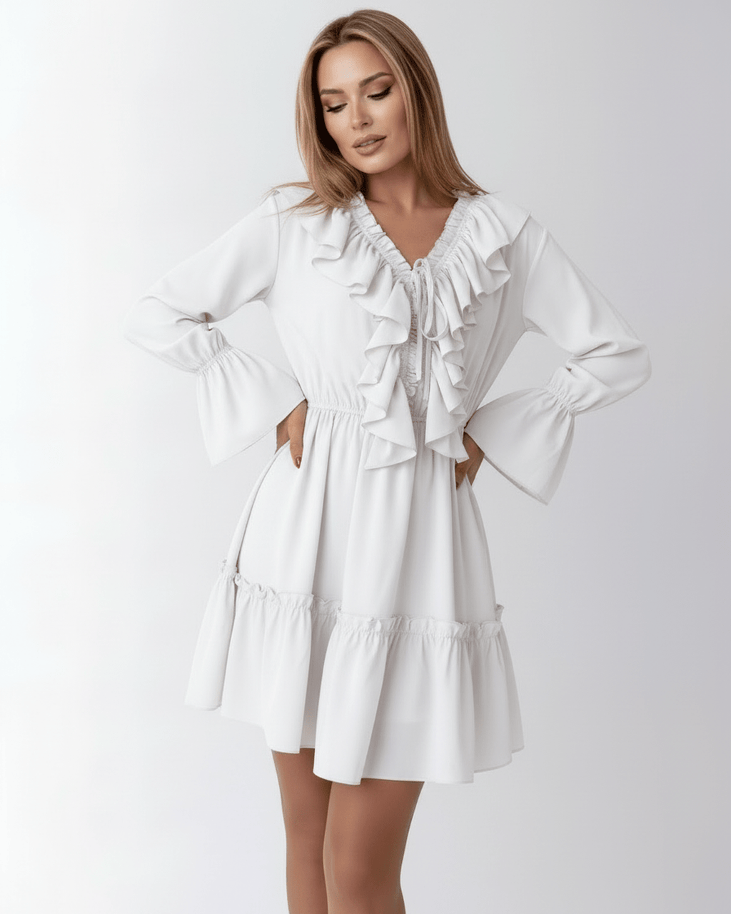 Lauven Luna Mini Dress featuring ruffled V-neck and elastic waist for a delicate silhouette.