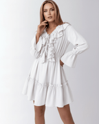 Luna Mini Dress by Lauven featuring ruffled V-neck and elastic waist for a flattering silhouette in white.