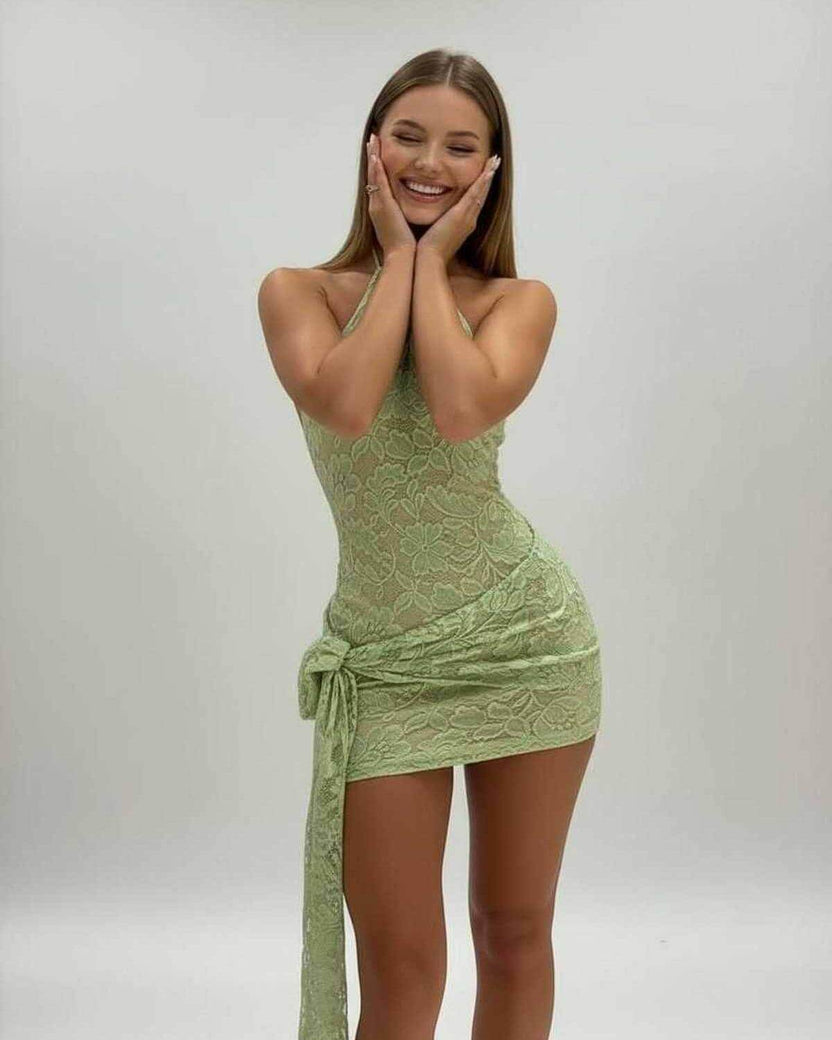 Luna Mini Dress by Lauven in soft green lace, featuring a halter neckline and stylish low waist silhouette.