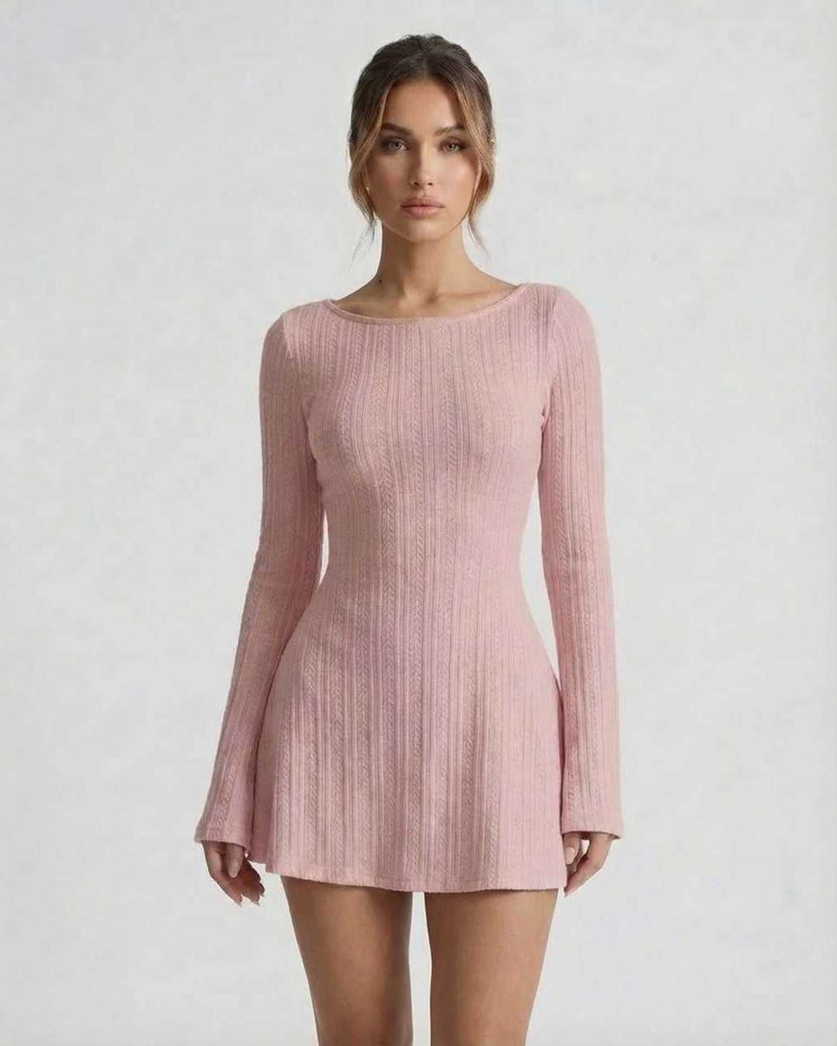Luna Mini Dress by Lauven, soft pink cable knit long sleeve, backless, cozy silhouette, flared sleeves.