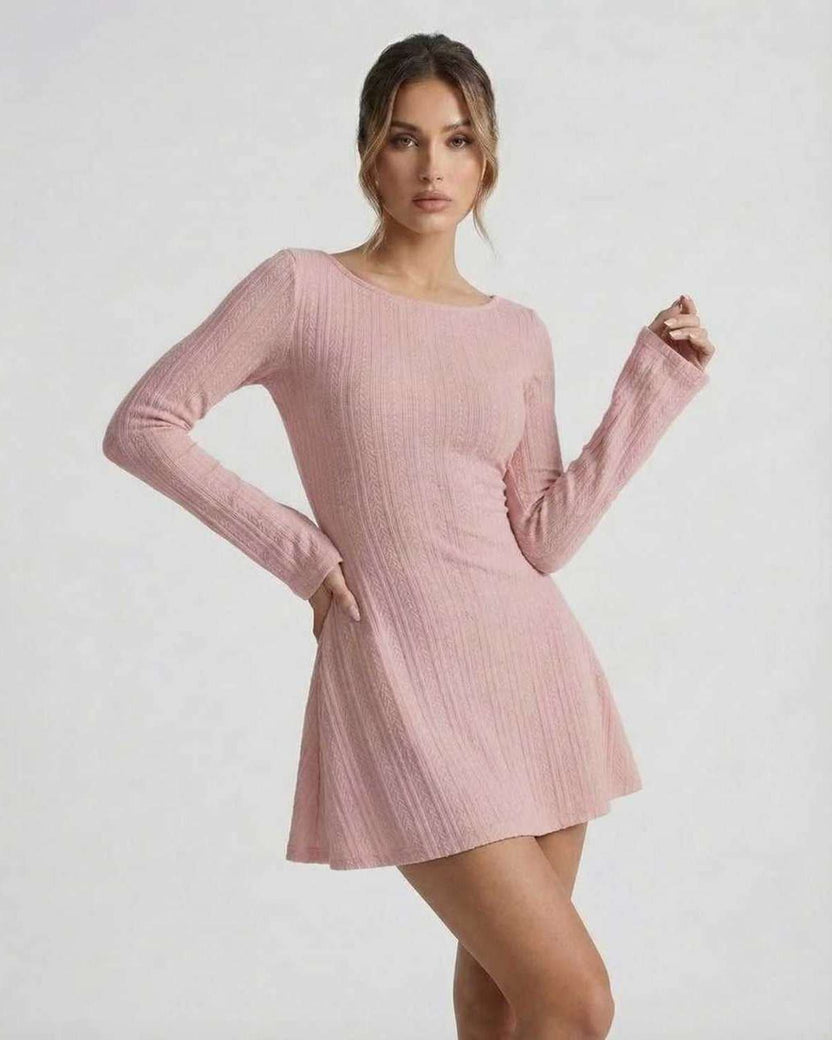 Luna Mini Dress in soft pink cable knit with long sleeves and backless design by Lauven.