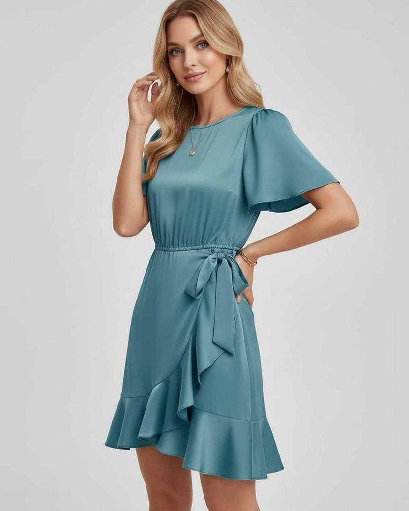 Lauven Luna Mini Dress in serene teal with satin finish, ruffle hem, tie waist, and flutter sleeves.
