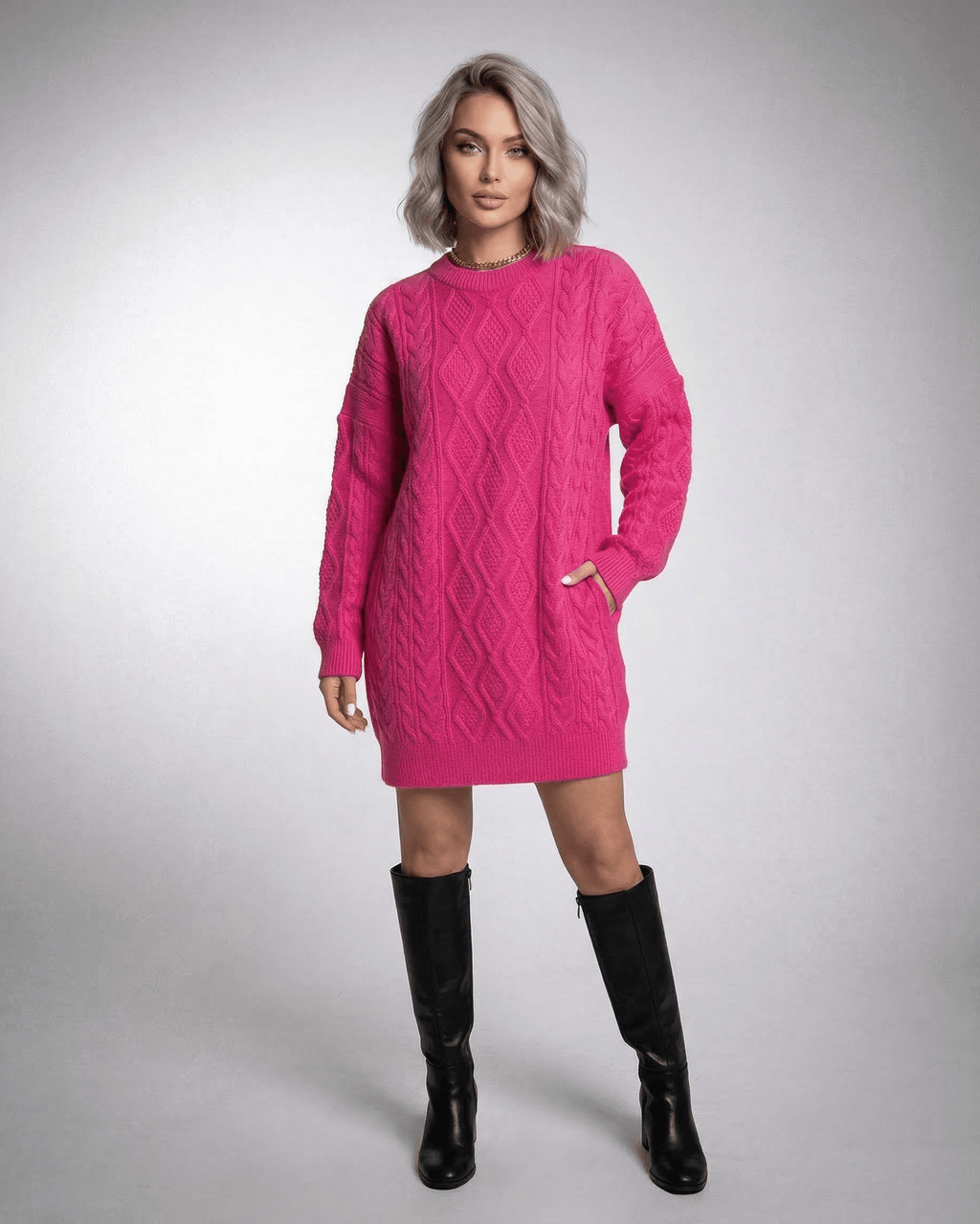 Luna Mini Dress by Lauven in vibrant pink cable knit with long sleeves and relaxed silhouette.