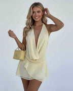 Luna Mini Dress by Lauven features a chiffon draped silhouette in yellow, perfect for elegant occasions.