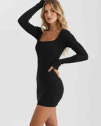 Lunara Mini Dress by Lauven, featuring a black ribbed knit, square neckline, and long fitted sleeves for a sleek look.