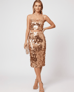 Lustra Sequin Set featuring cropped top and midi skirt, embellished with reflective sequins by Lauven.