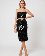 Lustra Sequin Set by Lauven features a high-shine two-piece with reflective sequins, perfect for modern glamour.