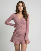 Lyra Mini Dress in dusty rose ribbed knit by Lauven, featuring a V-neckline and form-fitting silhouette.