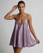 Lyra Mini Dress by Lauven in soft lilac satin with rhinestone detail, showcasing a flattering A-line silhouette.