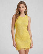 Lyra Mini Dress by Lauven, yellow sheath dress with subtle shine, featuring a sleeveless design and fringe detail.