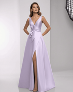 Lyrielle Maxi Dress in lavender satin with A-line silhouette, V-neck, and elegant bow detail by Lauven.