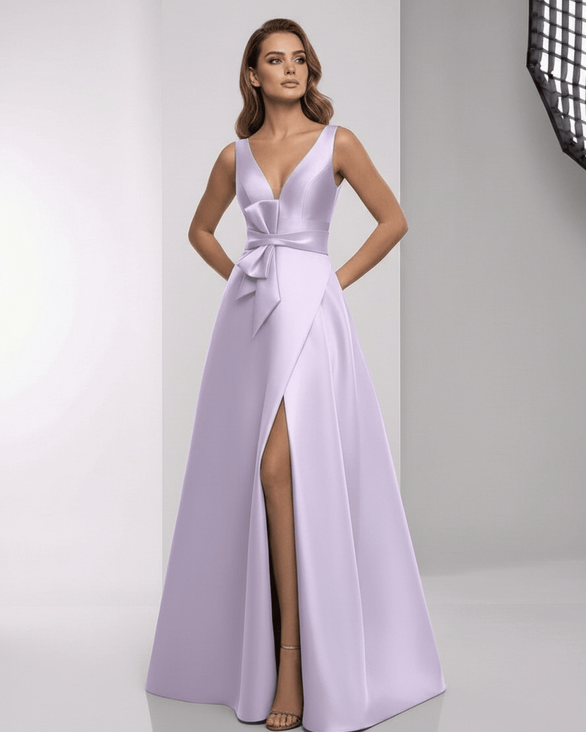 Lyrielle Maxi Dress in lavender satin with A-line silhouette, V-neck, and elegant bow detail by Lauven.