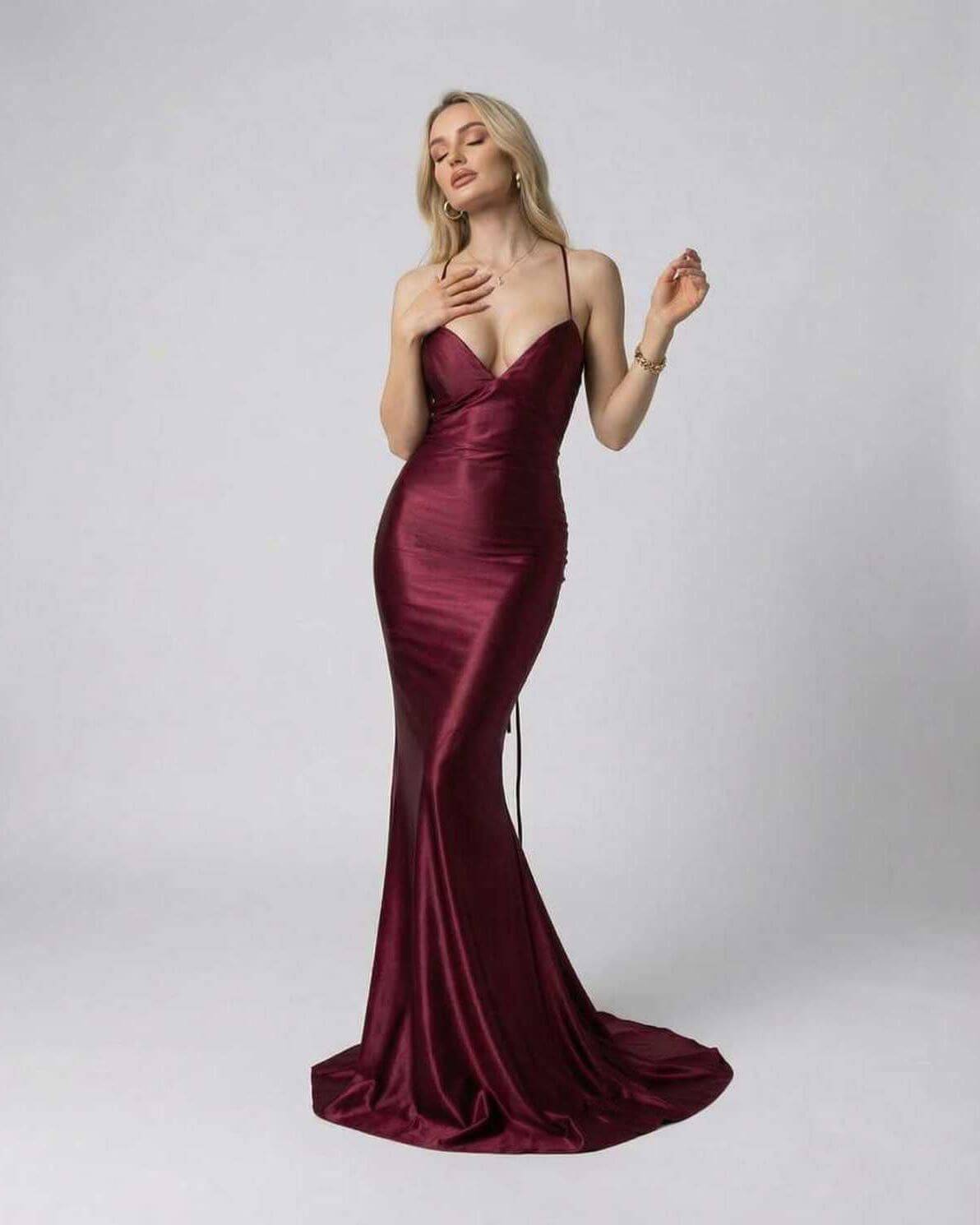 Marcelline Maxi Dress by Lauven, luxurious burgundy satin evening gown with deep V-neckline and spaghetti straps.