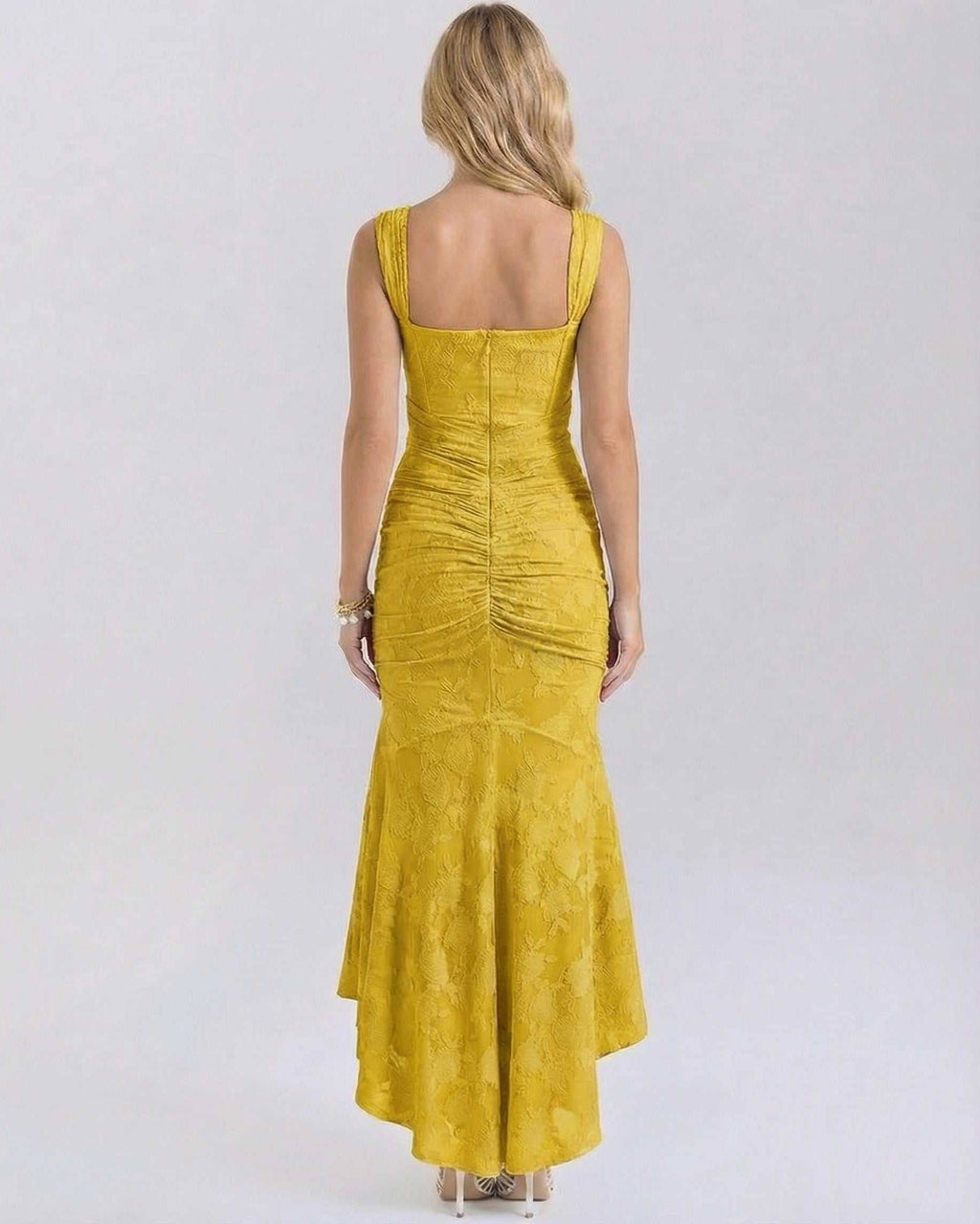 Back view of the Marigold Maxi Dress by Lauven, featuring a square collar and pleated details in vibrant yellow.