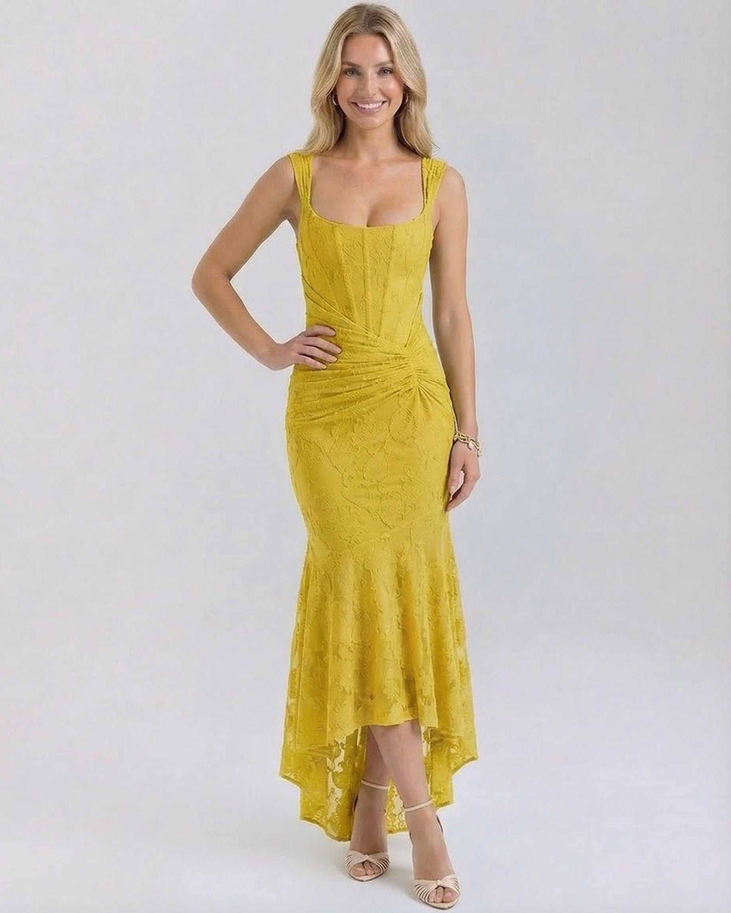 Marigold Maxi Dress by Lauven in vibrant yellow with square neckline and asymmetric hemline.