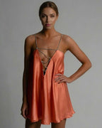 Marigold Mini Dress by Lauven, satin A-line dress in burnt orange with beaded spaghetti straps and flared skirt.