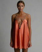 Lauven Marigold Mini Dress in satin burnt orange with flared silhouette and beaded spaghetti straps.