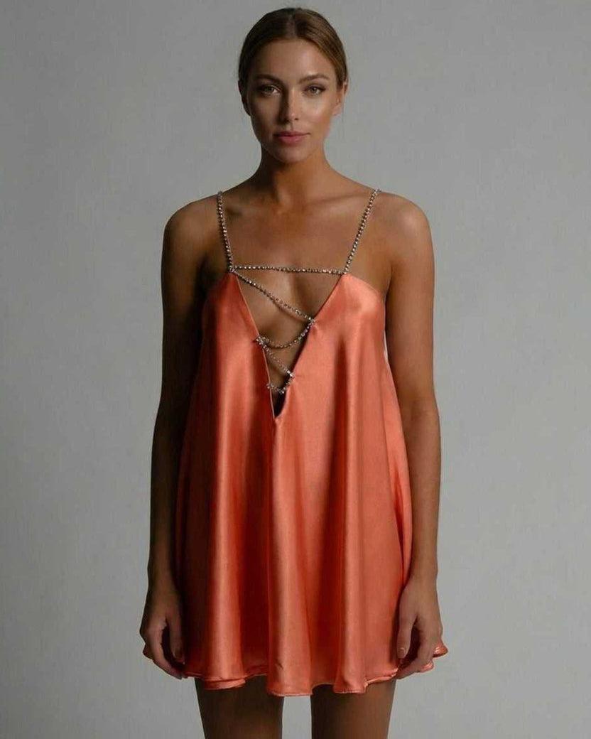 Lauven Marigold Mini Dress in satin burnt orange with flared silhouette and beaded spaghetti straps.