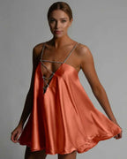 Lauven Marigold Mini Dress - A-line flared silhouette in radiant burnt orange satin with beaded spaghetti straps.