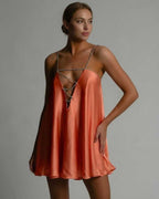 Marigold Mini Dress by Lauven in radiant burnt orange satin with beaded spaghetti straps for a stylish A-line silhouette.