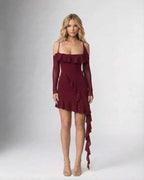 Lauven Marina Mini Dress featuring ruffled asymmetric hem in solid burgundy color.