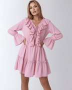 Marina Mini Dress by Lauven featuring ruffles, elastic waist, V-neckline, and flared sleeves in soft pink.