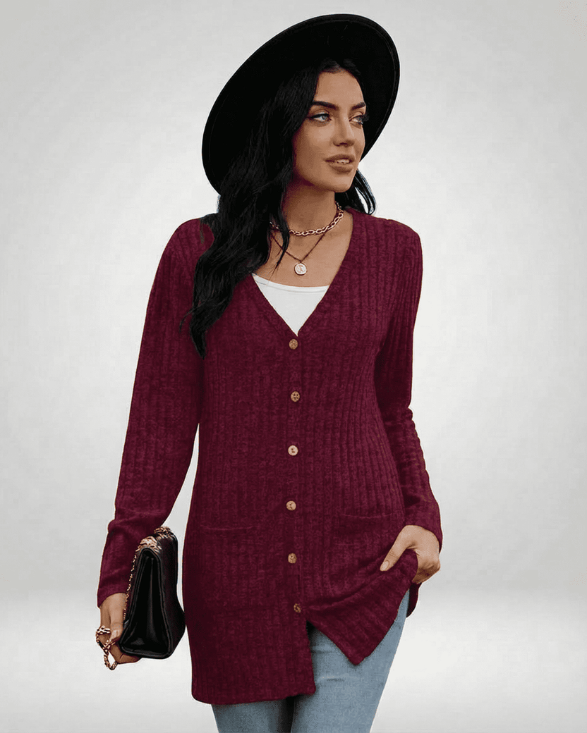 Stylish woman wearing a Merlot Cardigan by Lauven with a longline silhouette and button-front design.