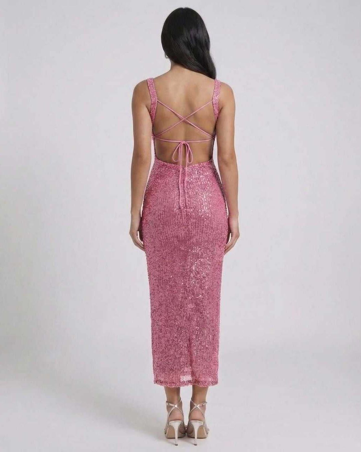Mira Midi Dress by Lauven in Pink sequined elegance featuring crisscross back detail.