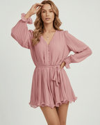 Mirabel Mini Dress by Lauven showcasing a romantic dusty rose pleated design with flowing chiffon fabric.