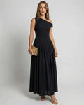 Monaco Maxi Dress model in black one shoulder design showcasing elegant A-line silhouette by Lauven.