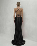 Monaco Maxi Dress featuring lace-up back, V-neck silhouette, and sleek satin finish by Lauven.