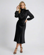 Monaco Midi Dress by Lauven, elegant black satin high neck dress with long sleeves, perfect for day to evening wear.