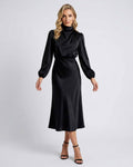 Monaco Midi Dress by Lauven in black satin, featuring a high neck and long sleeves for elegant sophistication.