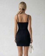 Monaco Mini Dress showcasing a black bodycon fit with corset detail and spaghetti straps, by Lauven.