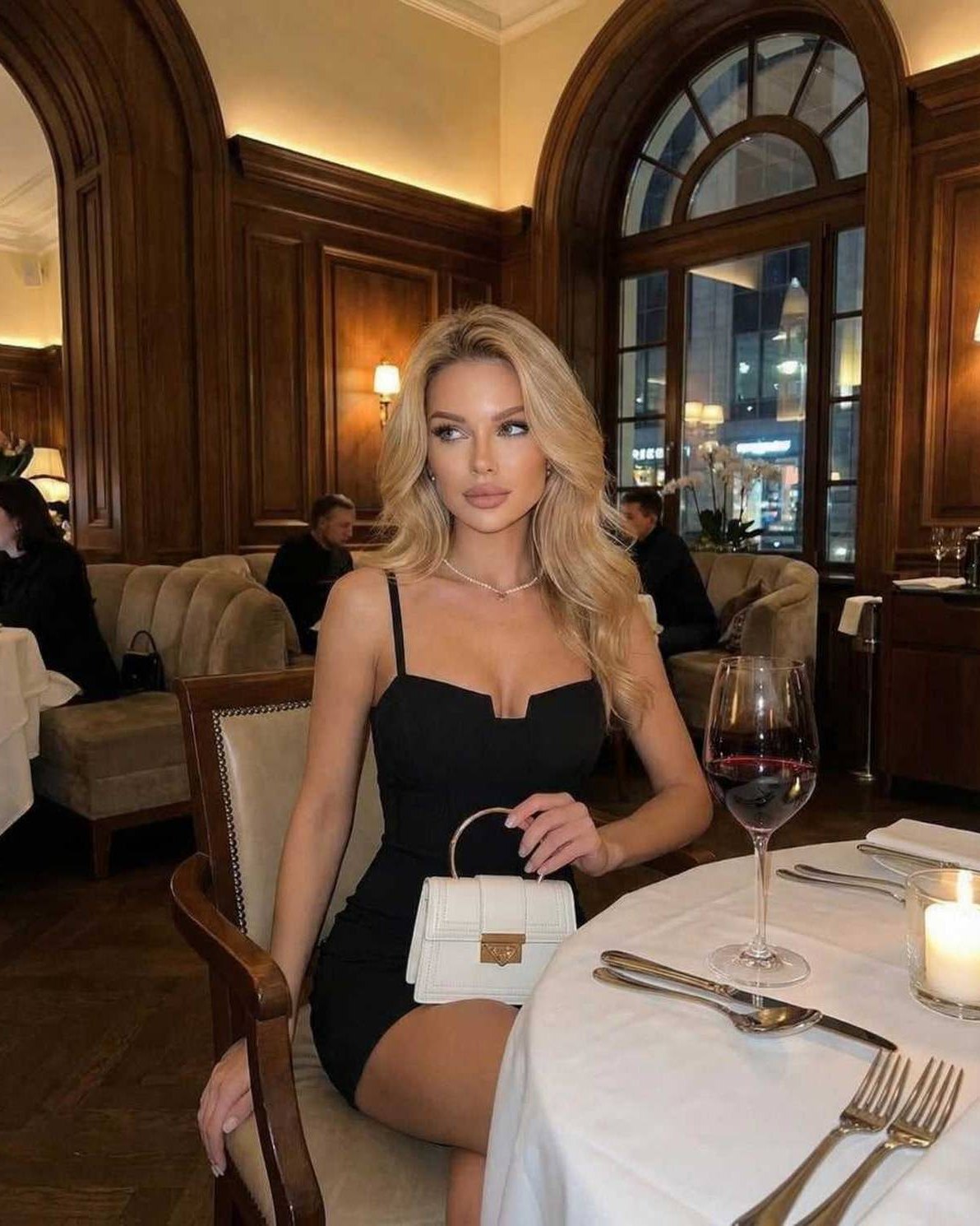 Monaco Mini Dress – Black bodycon mini dress, corset detail, sophisticated look by Lauven, perfect for elegant dining.
