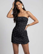 Monaco Mini Dress - Strapless black floral mini dress by Lauven with 3D rose appliqué for modern elegance and evening style.