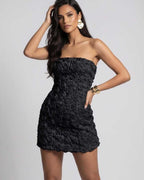 Monaco Mini Dress – Strapless black floral mini dress by Lauven featuring 3D floral appliqué for a modern, elegant look.