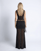 Monaco Set back view of women's black lace two-piece set by Lauven, featuring a sleeveless crop top and high-waisted maxi skirt.